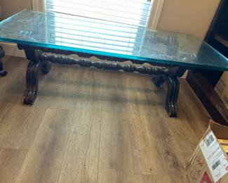 #45 wood base, glass top coffee table, 56x26x18 $100.00