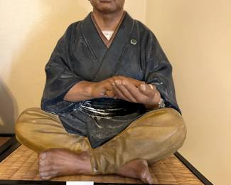 #204 mudman sitting, 10" tall $90.00