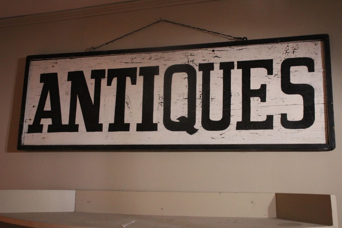 "Antiques" trade sign