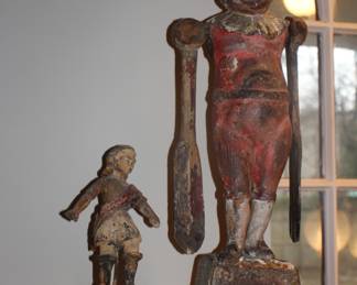 Antique carved Santos & whirly gig figure with oar arms