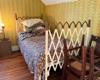 Antique iron folding / collapsible bed