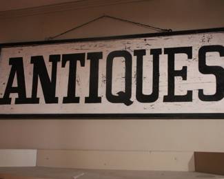 "Antiques" trade sign