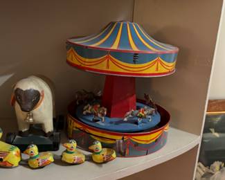 Vintage tin carousel toy