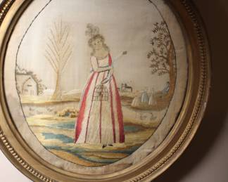 Silk embroidery scene of a woman