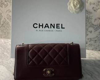 Chanel Mademoiselle Flap Bag 2017 Burgundy Sheepskin Leather - Price 2,500
Gold- Tone Hardware
Chain- Link Shoulder Straps
Canvas Lining
Turn- Lock Closure at Front 
Estimated item measurements 
Shoulder- Strap drop: 21.5”
Height: 6.75”
Width: 9.75”
Depth: 2.75”
Item # CHA380609