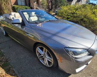 2015 BMW 650i Convertible with M Sport Package -silver with black roof with 87,800 miles - Garaged since 2015 - Priced at $19,400