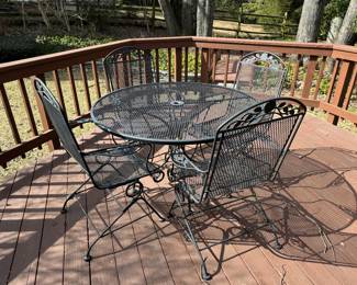 Wrought Iron Patio Table (48"W x 28"H) with 4 Rocker Armchairs & Side Table 
