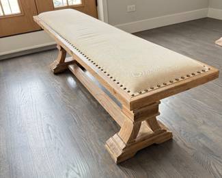 Cream linen cushion with upholstery tack detailing