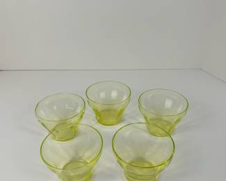 Uranium glass. Glows under blacklight!