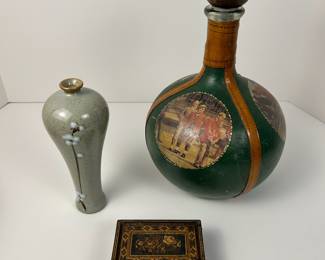 Fausto Corduri leather wrapped liquor decanter (right)