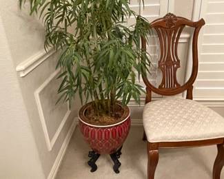 Large faux plant in ceramic planter