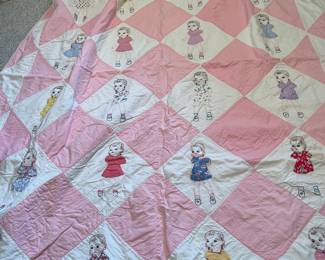 Vintage handmade quilt with embroidery