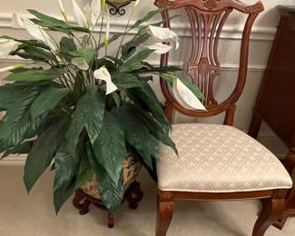 Large faux plant in ceramic planter