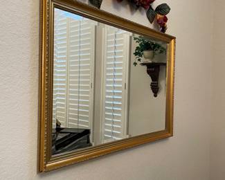 Gold framed mirror
