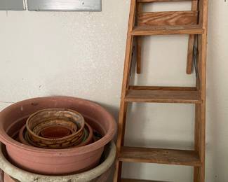 6 ft wood ladder and outdoor pots