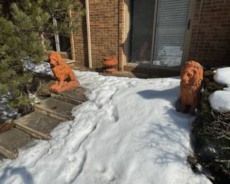 Pair of large terra cotta lions