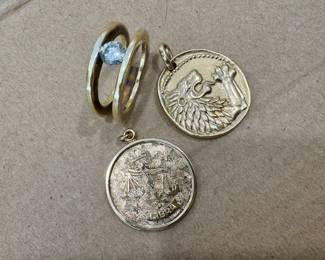 Large, over 1carat diamond ring with gold pendants