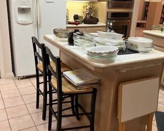 Full kitchen, great bar stools. Maytag side by side fridge