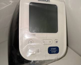 Omron brand blood pressure monitor 