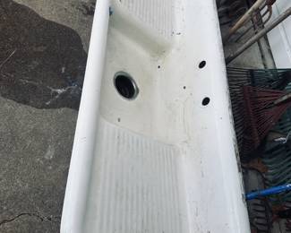 60" wide old sink, dirt looks like damage in photo, but will clean up well