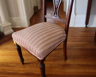 Delicate, small chair with shield back. 