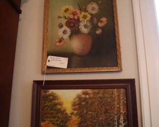 Two framed, oil paintings by Eva Sue Burns, in the living room.