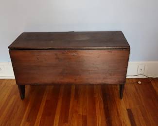 Handmade blanket chest from single pieces of wood, in the upstairs office room.