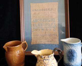 Old pieces, 3 pitchers and a sampler from the Smith side of the family.