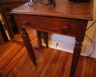 One of the hand crafted pieces made with square legs. Upstairs.