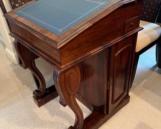 SECRET DOOR WITH DRAWERS BEHIND.