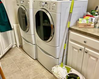 KENMORE H2E FRONT LOADING WASHER AND DRYER WITH BASE.