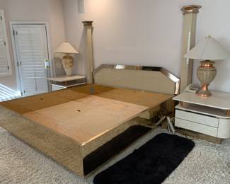 Entire 80's bronze wrapped platform bed with light up columns and side tables attached