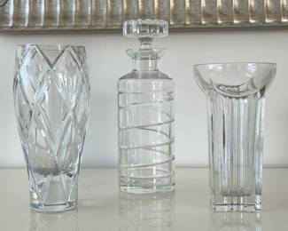 (4pc) Glass Items | Including two glass vases, a decanter with siwrled design, and a white ceramic planter. -  h. 10.25 x dia. 3.5 in (tallest)
