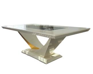 CONTEMPORARY DINING TABLE | Faux marble style modern dining table with inset glass top over a sculptural base with curve and block form with gold accent; accompanied by two leaves (each w. 12 in.) and protective cover. - h. 29.5 x w. 44 x l. 84 in (without leaves)
