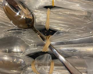 Mikasa 12 settings 
Dinner & Desert forks
Table & Teaspoons
Dinner knives 
Sugar spoon butter knife 
Slotted & Solid Spoons
Meat fork 