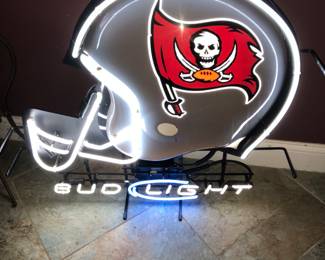 SOLD Buccaneers Neon Sign 33” x 36”.  Table top or hang on wall.  Bud Light blue neon.  Not shown are signed football and team t-shirts