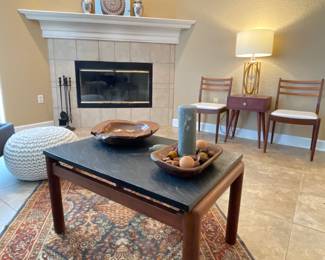 Vintage Persian rug 
Adrian Pearsall for Craft Associates Slate table 
Natural Wood bowls 