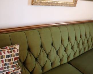 vintage boho chic Hollywood Regency green tufted sofa
