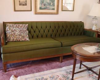 vintage boho chic Hollywood Regency green tufted sofa
