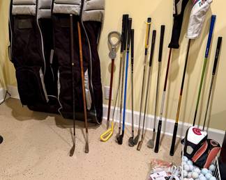 Golf clubs, training aids and hickory shaft antique clubs