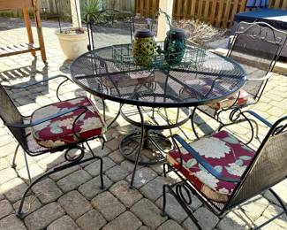 Cast iron table and 4 chairs 