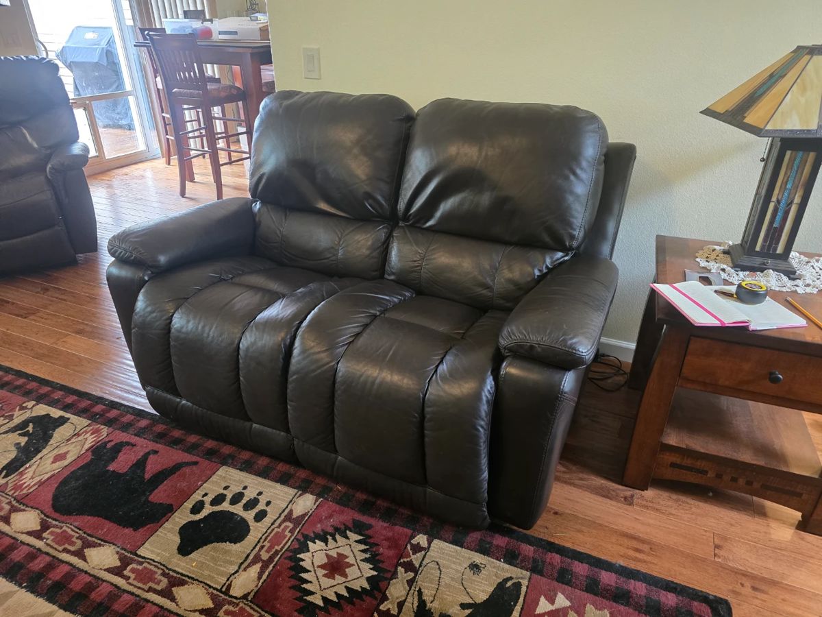 All leather electric loveseat $500.00 AVAILABLE NOW 