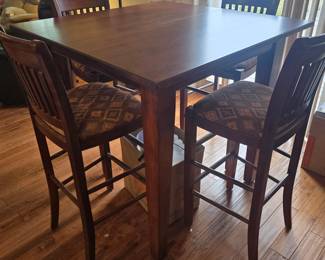 Beautiful Pub style dining room table $500.  66 in wide 20 in deep 40 in tall