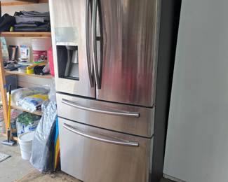 $400 OBO Samsung refrigerator very good condition homeowner says it's 7 years and paid $3,000 for it.