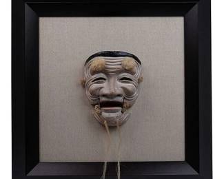 Lot 264: A Noh Mask of Okina, 19th Century Japan, Mounted in a Box Frame on Linen