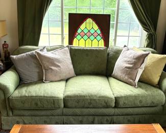 Sofa & coffee table not available. Stained glass, yes