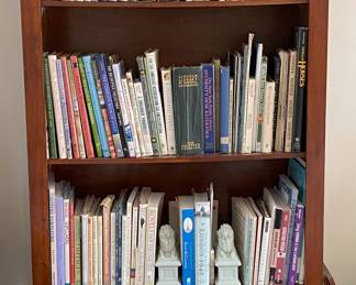 Tall bookcase is sold.  Lion bookends and books, lots are nonfiction, available. 