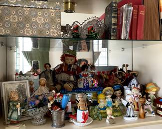 Smalls, vintage dolls, books etc. Most remaining items moved to dining room...