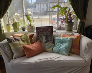 pillows, plants, original Godspell poster.  