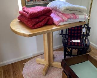 Blankets.      Butcher block rock maple has leaves, now put together and 2 low stools. Sold as set. 
